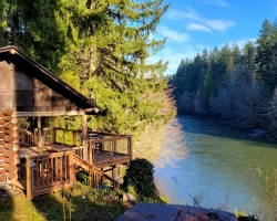 Log cabin right on the river river cabin washington